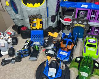 Imaginext Batman Collection – Action-packed Imaginext DC Super Friends playset featuring the Batcave and Gotham City Jail alongside an fleet of Batmobiles and character vehicles