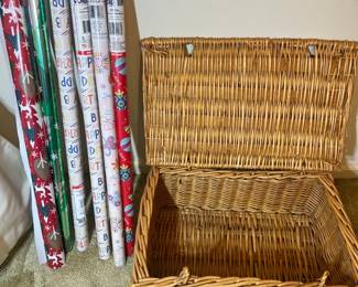 Large, vintage woven wicker hamper/trunk and assortment of birthday and holiday gift wrap