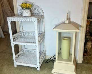 3-tier wicker shelf and large Duraflame candle
