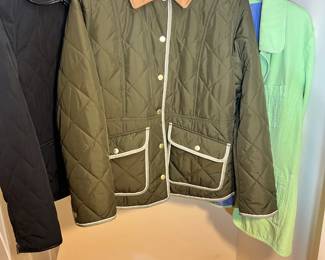 Women's outerwear featuring a diamond-quilted olive field jacket with a tan corduroy collar