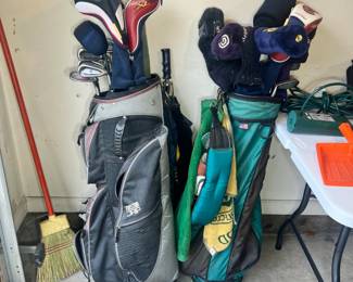 Golf: Two sets of clubs in bags (Master Grip and Cleveland)