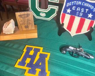 1930 authentic Notre Dame Stadium brick, plaque, and COA. A vintage 1959 "Dayton Champs East" shield, and various mid-century varsity letterman patches