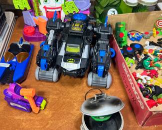 Joker’s Fun House & Action Figures – DC Super Friends Imaginext Joker's Fun House playset with a large assortment of heroes and villains, including a motorized Bat-tank