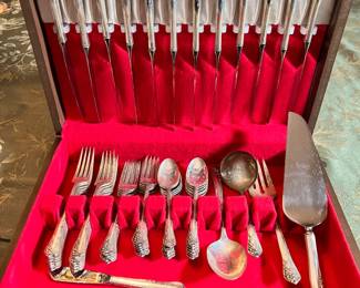 Sterling flatware in wooden box