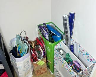 Assortment of birthday and holiday gift wrap and gift bags