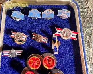 Dayton Industrial & WWII History – A rare collection of Inland GM 25-year service pins, WWII Army-Navy "E" Excellence in Production award pins, and vintage military service rosettes
