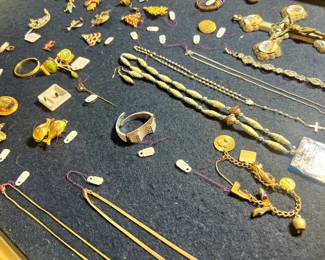 Jewelry: 14K gold chains, charms, bracelets, and vintage brooches