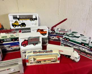 Die-Cast & Heavy Haulers – High-quality Ertl and First Gear die-cast metal replicas, featuring the Citgo Mack Tanker Truck, Consolidated Freightways "CF" tractor-trailer, and a P-I-E Pacific Intermountain Express van