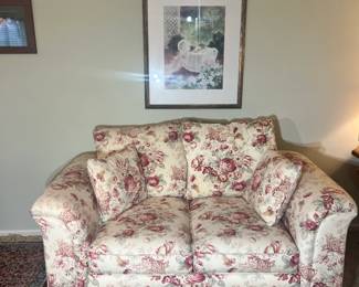 Upholstered Seating: Large floral rose pattern loveseat