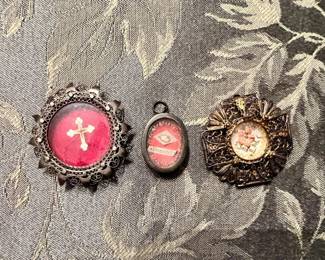 Three ornate filigree reliquaries containing sacred remnants of Saint Gaspar del Bufalo, Saint Donatus, and a fragment of the True Cross