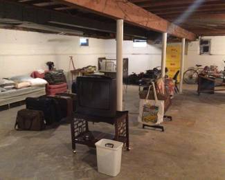 Tv, cart, bedroom linens, luggage 