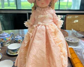 Madame Alexander precious doll with stand