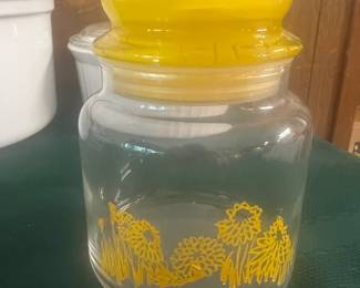 Vintage yellow glass jar with lid