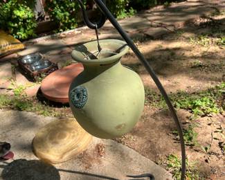 Outdoor hanging planter on metal hanger