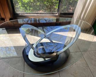 This is a great Coffee Table. Very vintage mid-century and space age.!
