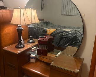 . . .  waterfall-era vanity with accent mirror