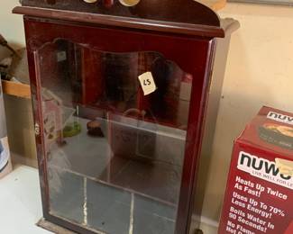 #194	DISPLAYcabinet with 3 shelves 1 glass door 14x6x24	 $20.00 