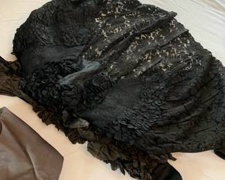 #87	1890s Victorial Mourning Wear - Includes the Underskirt, skirt, 3 cape/jackets, Head piece, Shawl, silk dress, outer skirt and scarf 	 $300.00 