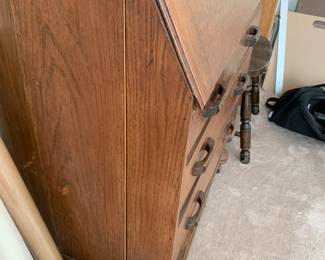 #126	Wood Secretary w/2 leaded glass doors w/2 shelves & 3 drawers w/flip-front and cubbies - 28x15-27x72" tall (as is side crack and trim on bottom)	 $100.00 