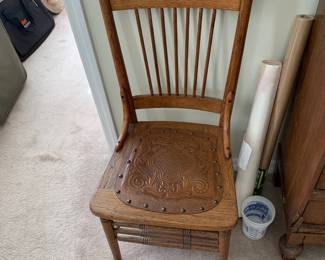 #125	Odd Oak w/leather Bottom and nailhead trim chair	 $30.00 