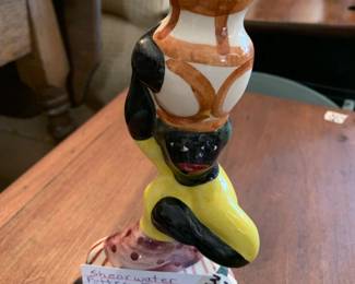 #322	Shearwater Pottery Figurine Black Anericana Woman Carrying Basket Candle Holder	 $50.00 