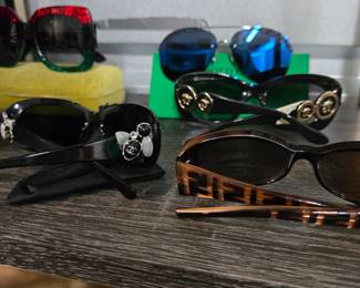Many designer sunglasses Chanel Dior Verace Fendi Gucci Bottega Venetta and more