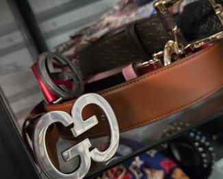 Many Gucci belts