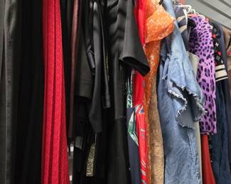 Racks of designer dresses, many with tags