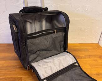 Nice rolling under seat suitcase
