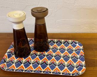 Newer salt and pepper mills with colorful tray