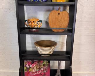 Wooden wall shelf with all the contents