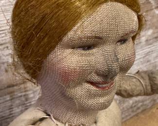 She’s quite fancy and may be a Russian Stockinette doll 