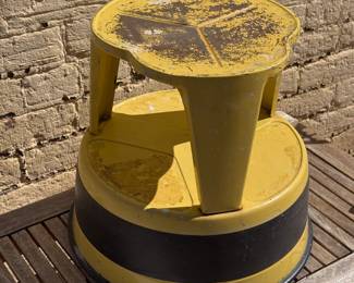 Vintage rolling step stool in good working condition 