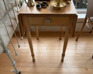 Pine drop leaf table with one drawer.  18.5 "w x 20d x 29"h as shown, with each leaf up it is 36"w.