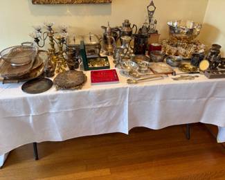 Silverplate, sterling, brass and pewter for sale during in-person shopping hours.