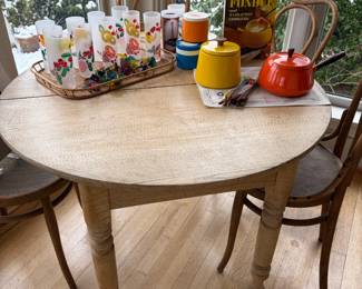 Round vintage pine four legged table with apron.  42" diameter x 28.5"h.