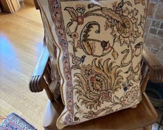 Antique pillows for sale during in-person shopping.