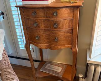 Antique serpentine front tall dresser.  22.5"w x 15.5"d x 43"h.