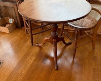 $120. Antique round pedestal flip top table. as found 30 inch diameter by 26 1/2 inches high.   Several caned seat sides chairs in the sale during in-person shopping hours.