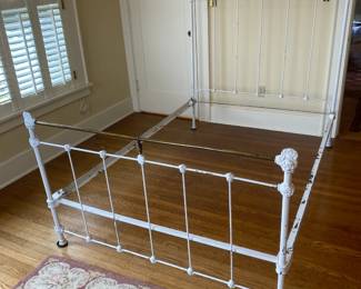 Antique wrought iron bed.  Full size.  Headboard and Footboard are 54"w.  Headboard is 57"h and footboard is 35"h.