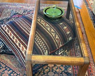 $130 Vintage glass and wood base coffee table.  49.5"w x 21.5"d x 16"h.