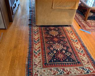 $860. Antique  Kazak rug.   13' 10" x 3'7"