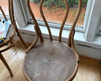 Four Bentwood chairs.