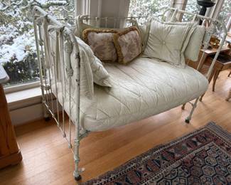 Antique iron settee with cushions.  Photo following without cushions.  as found fading on cushions54"w x 29"d x 41.5"h