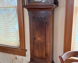 Antique grandfather clock. 19.5 inches wide by 9.5 inches deep by 78 inches high.