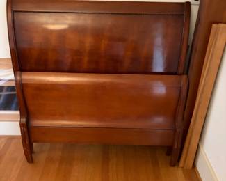 Mahogany twin bed frame.