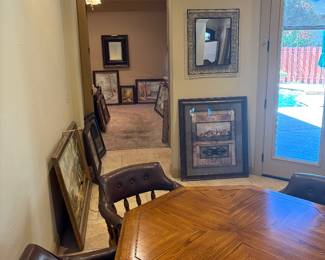 Wooden dining table/chairs and additional oil paintings.
