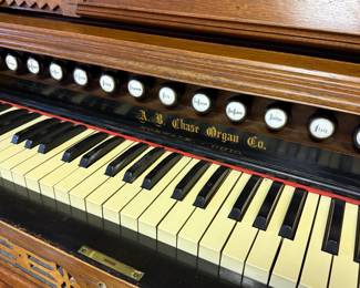 Peerless Pump Organ, Circa 1900 by A. B Chase Organ Co. Patented Pipe cone action, Oak hardwood case with quality craftsmanship, Sound is heard when pumping pedals, weight of organ is very reasonable makes it easy to move around. measures 52" W, 24"D, 52" h