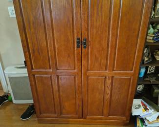 oak TV cabinet with lots of storage