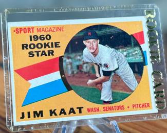 This lot features a vintage 1960 Topps “Sport Magazine Rookie Star” baseball card featuring pitcher Jim Kaat of the Washington Senators. 